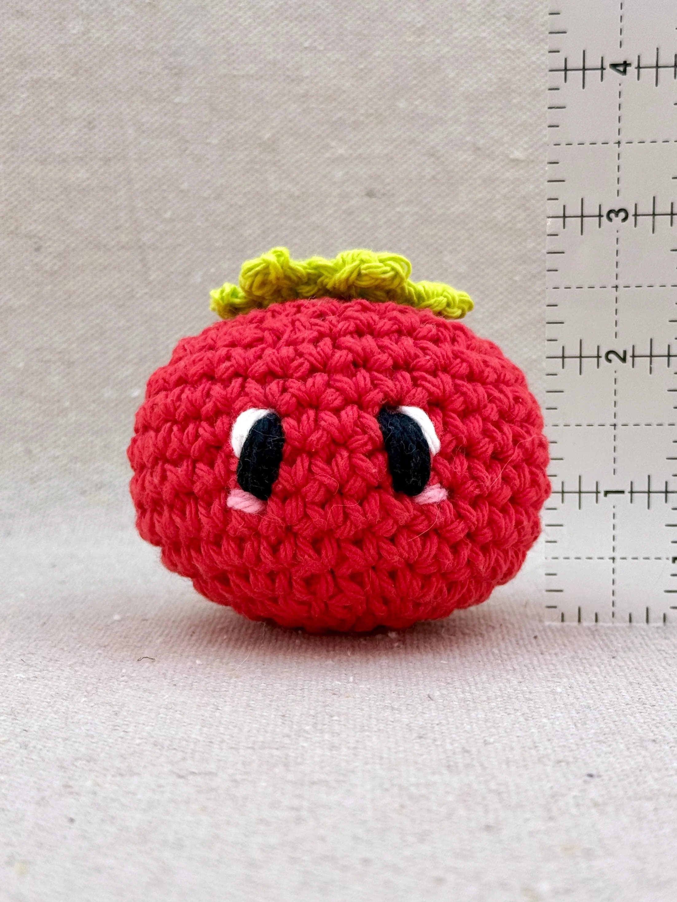 Crochet tomato measuring 2.25 inches tall not including leaf top (Copy)