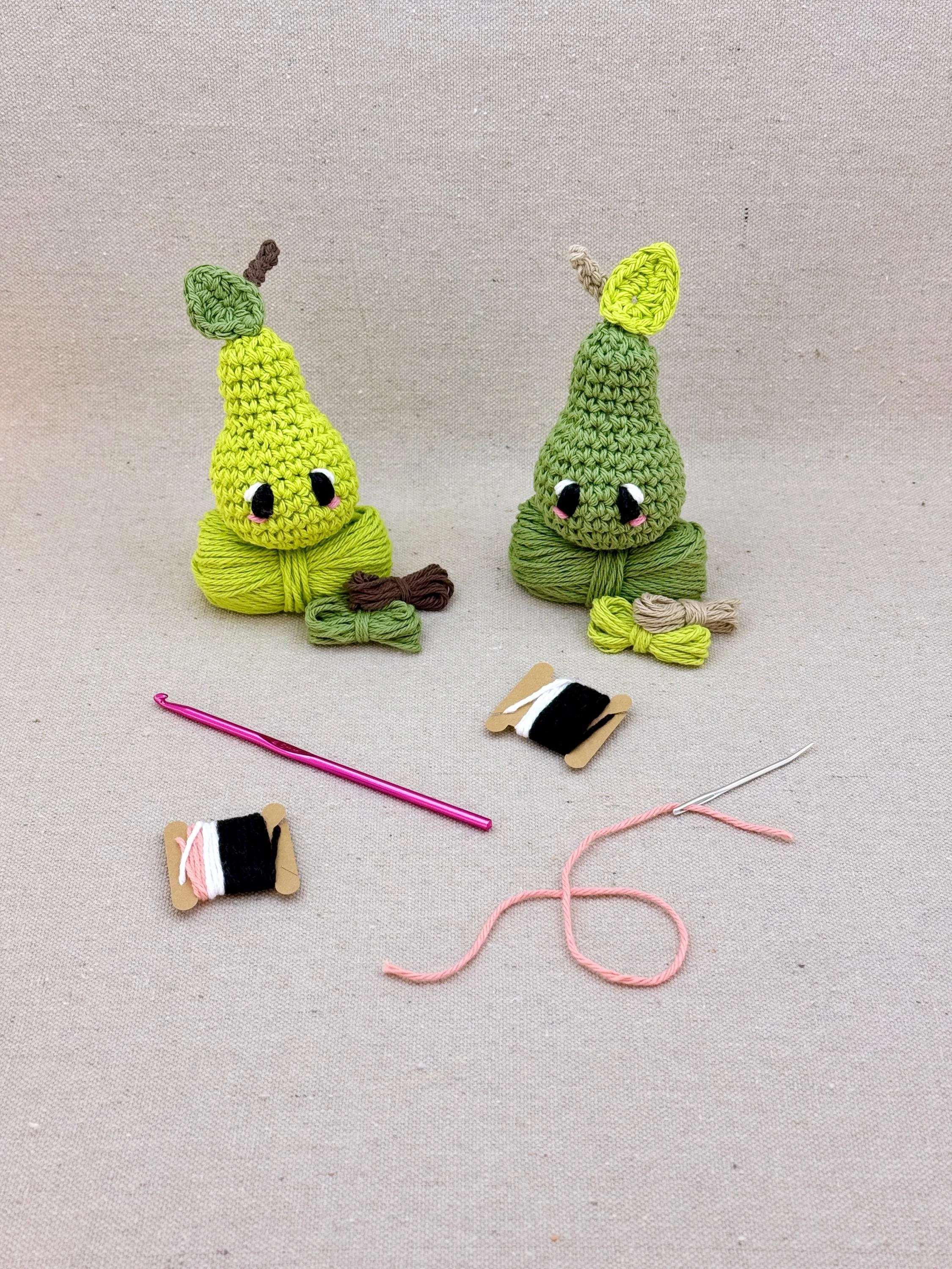 Two amigurmi pears in lime green and sage green on matching colour yarn (Copy)