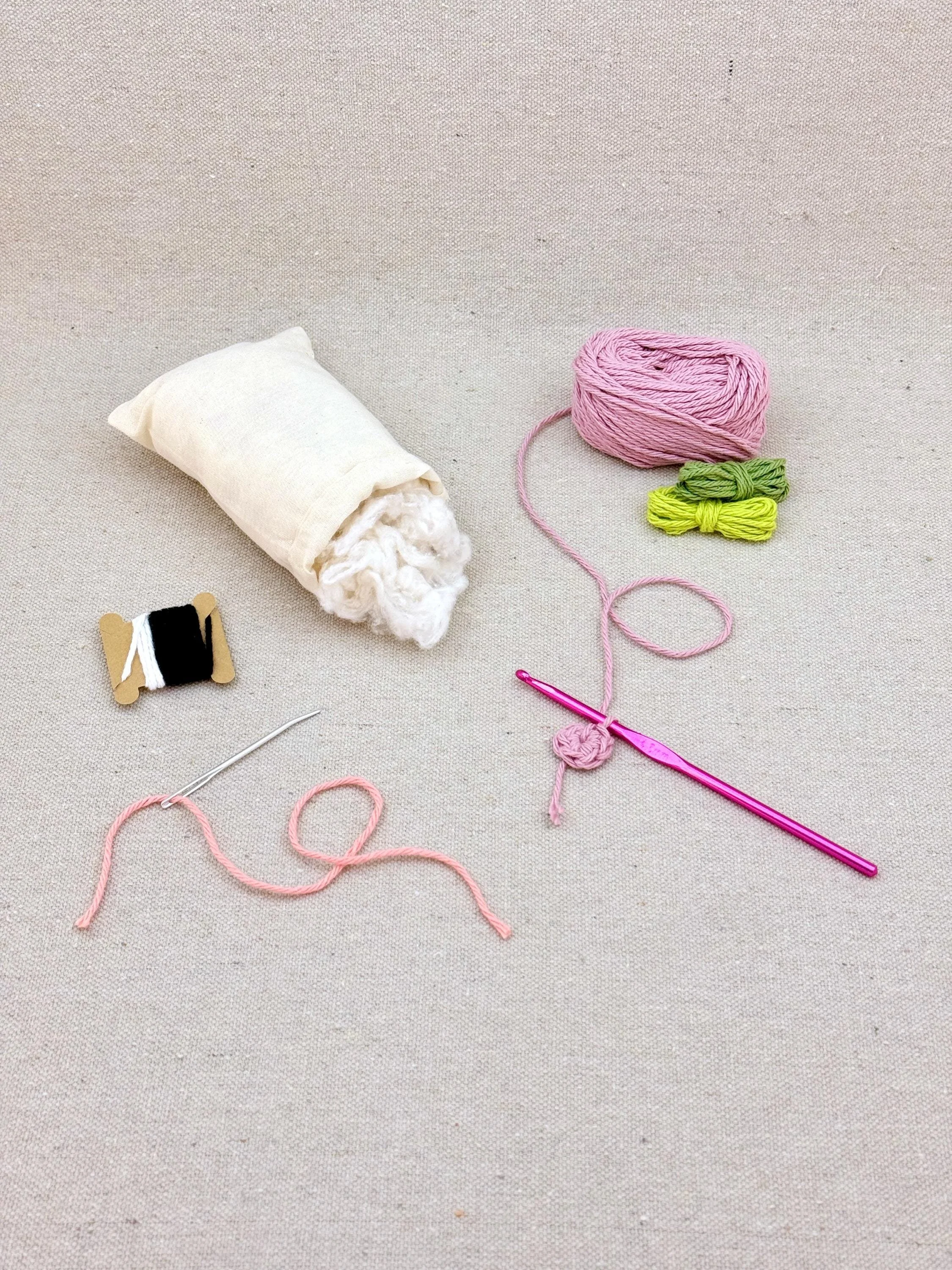 A bubblegum amigurumi peach mid project using a DIY crochet kit