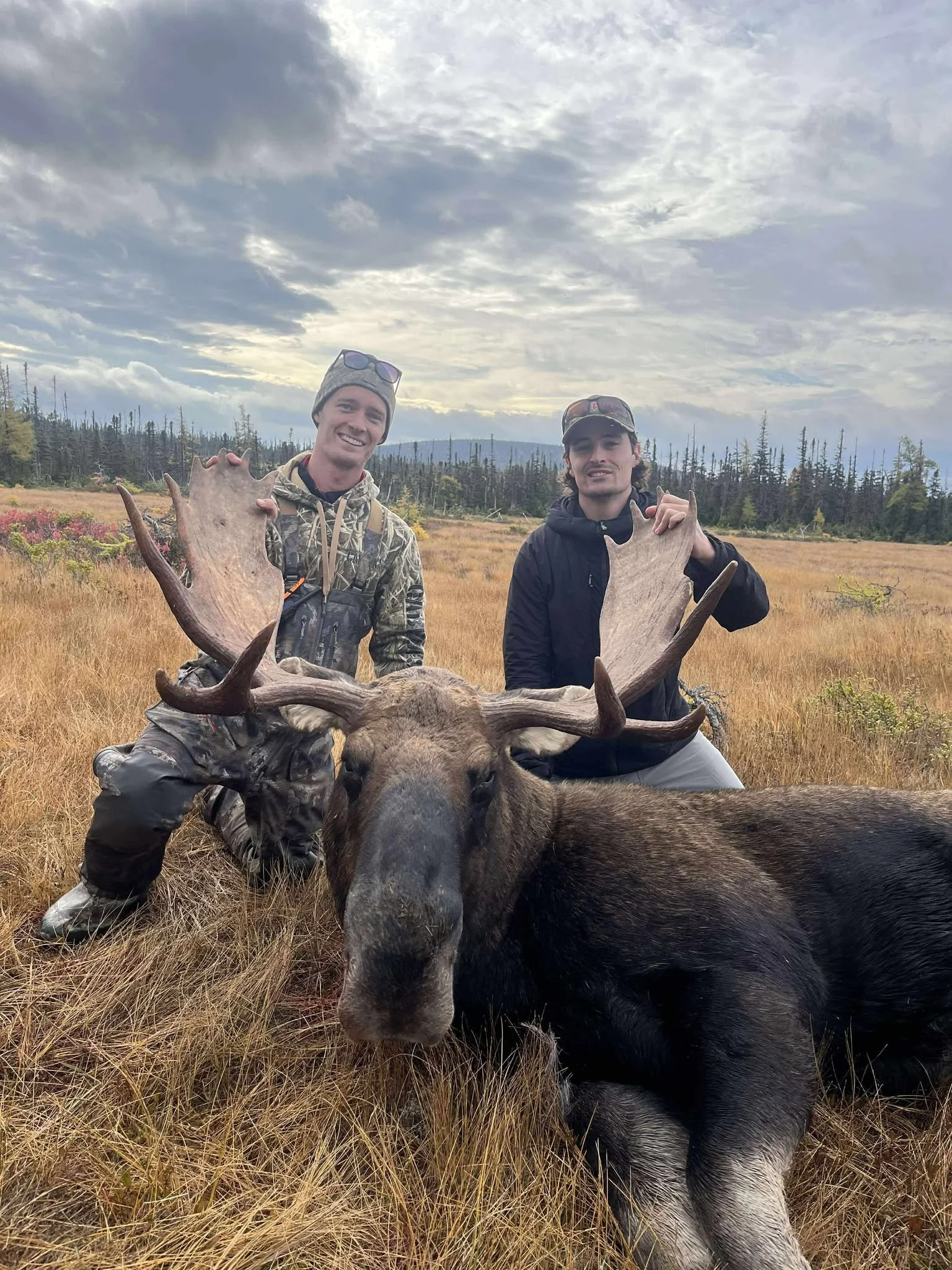 hunter with moose.jpg
