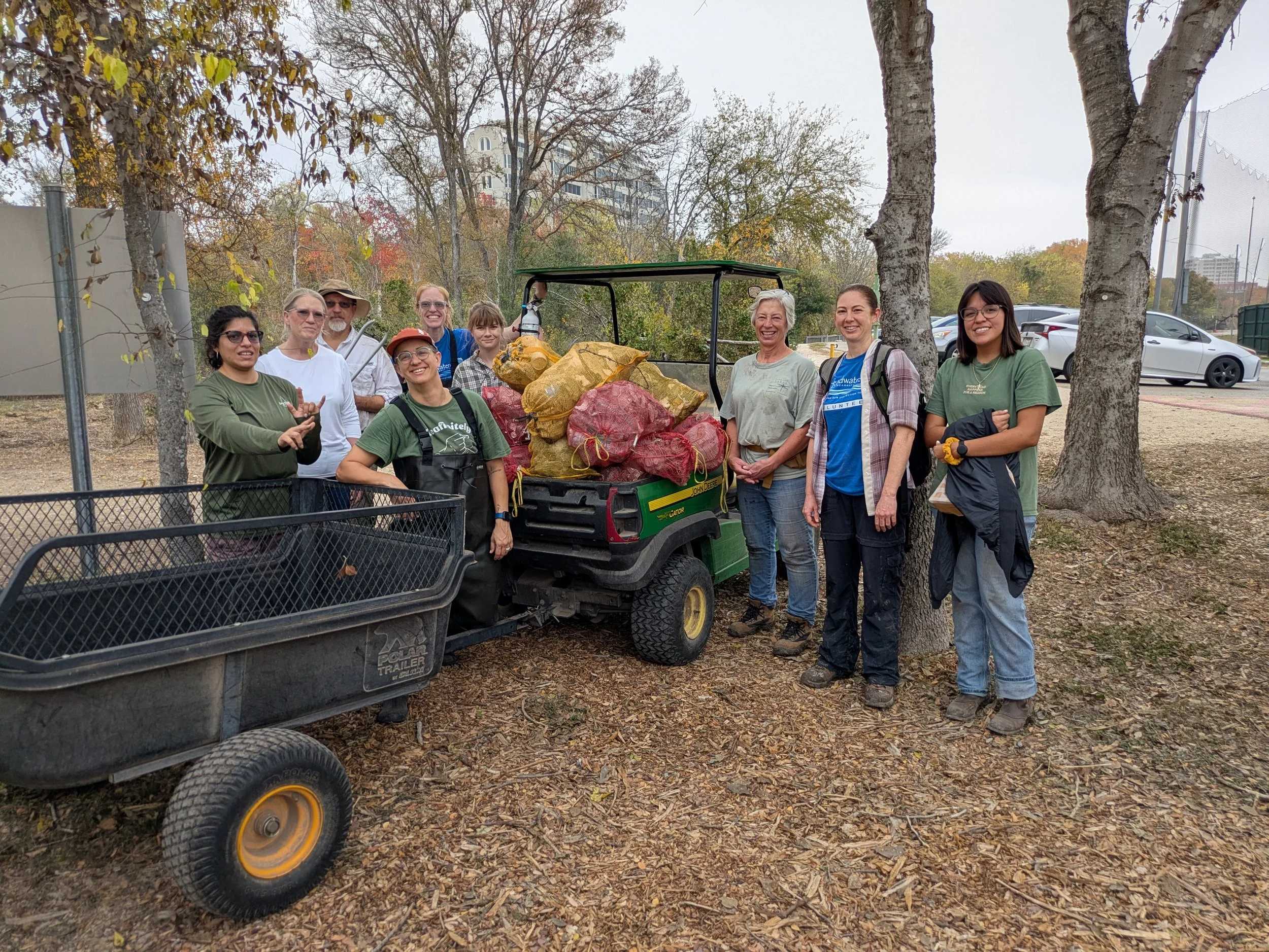 Volunteers at the Headwaters for the San Antonio River cleaning up litter