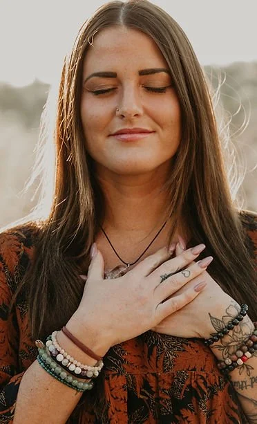 Reiki session with Dani Radigan, trauma-informed somatic therapist guiding somatic awareness exercises in private session
