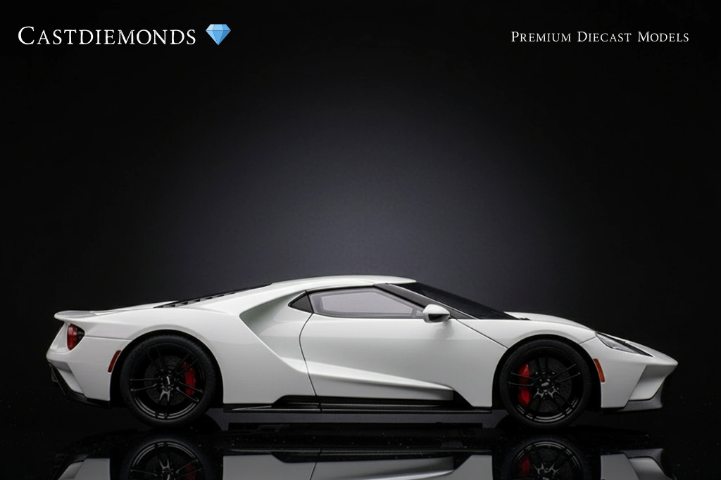 A white diecast model sports car with black wheels and red brake calipers, displayed against a black background.