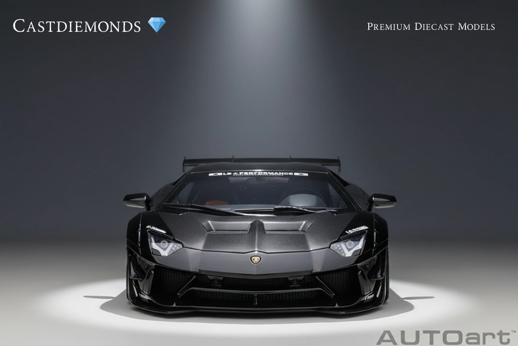Black diecast model Lamborghini supercar displayed in a studio setting.