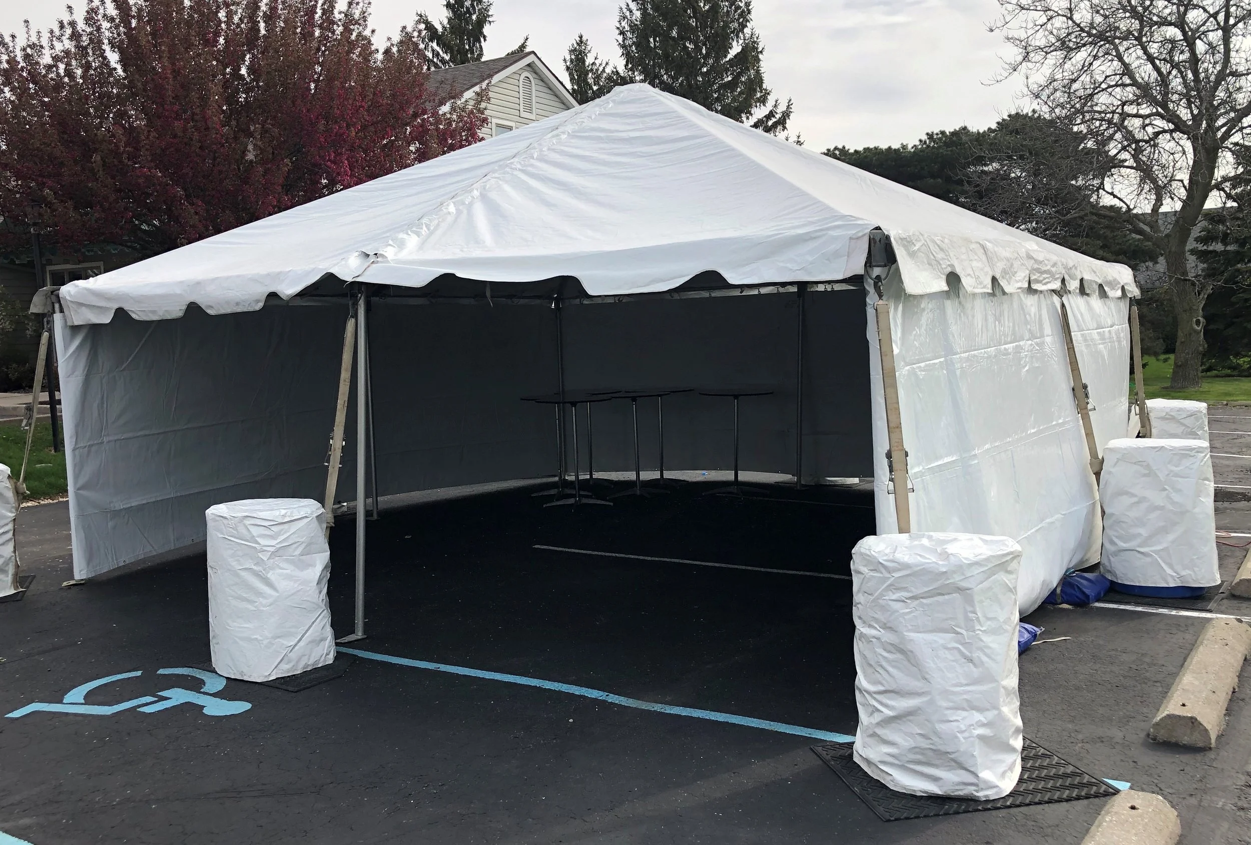 20 x 20 frame tent with water barrels.jpg