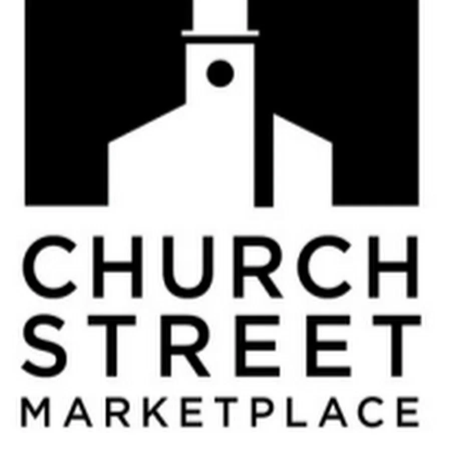Black and white logo for Church Street Marketplace with an illustration of a church steeple above the text.