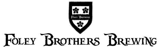 Foley Brothers logo with a shield design, featuring Mickey Mouse heads at the top and a clover at the bottom.