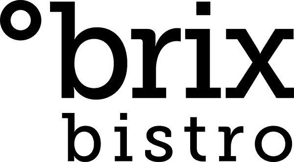 A black-and-white drawing of a large whale swimming in the ocean.