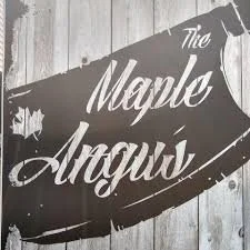 Sign with the text 'The Maple Anway' on a wooden wall.