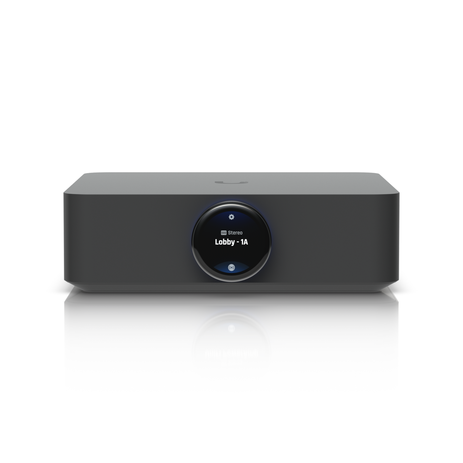 A modern, rectangular black speaker with a circular display in the center showing the text 'Lobby - 1A' and schedule information. The speaker is set against a black background, with a reflection below it on a glossy surface.