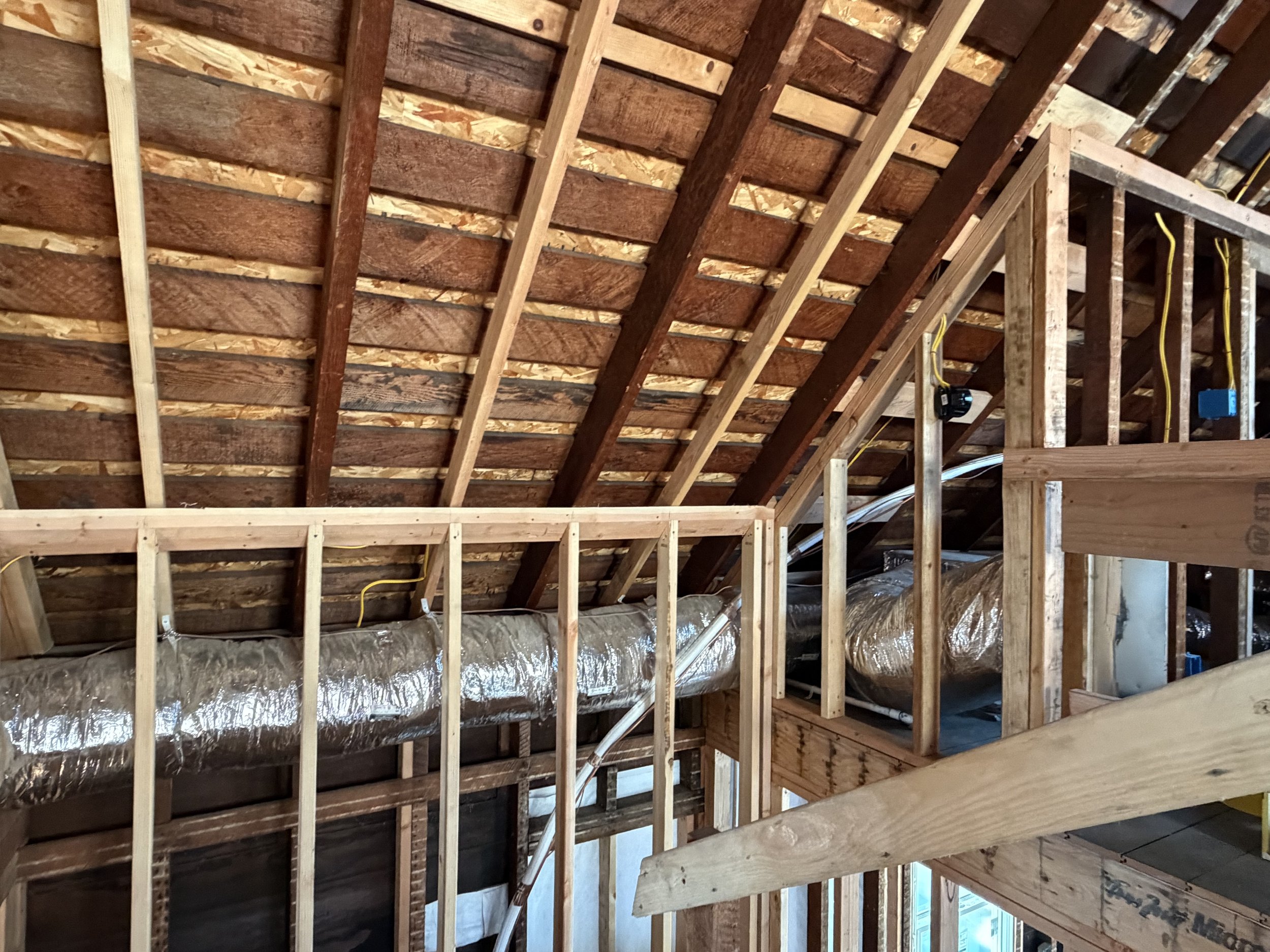HVAC duct in stairs.jpeg