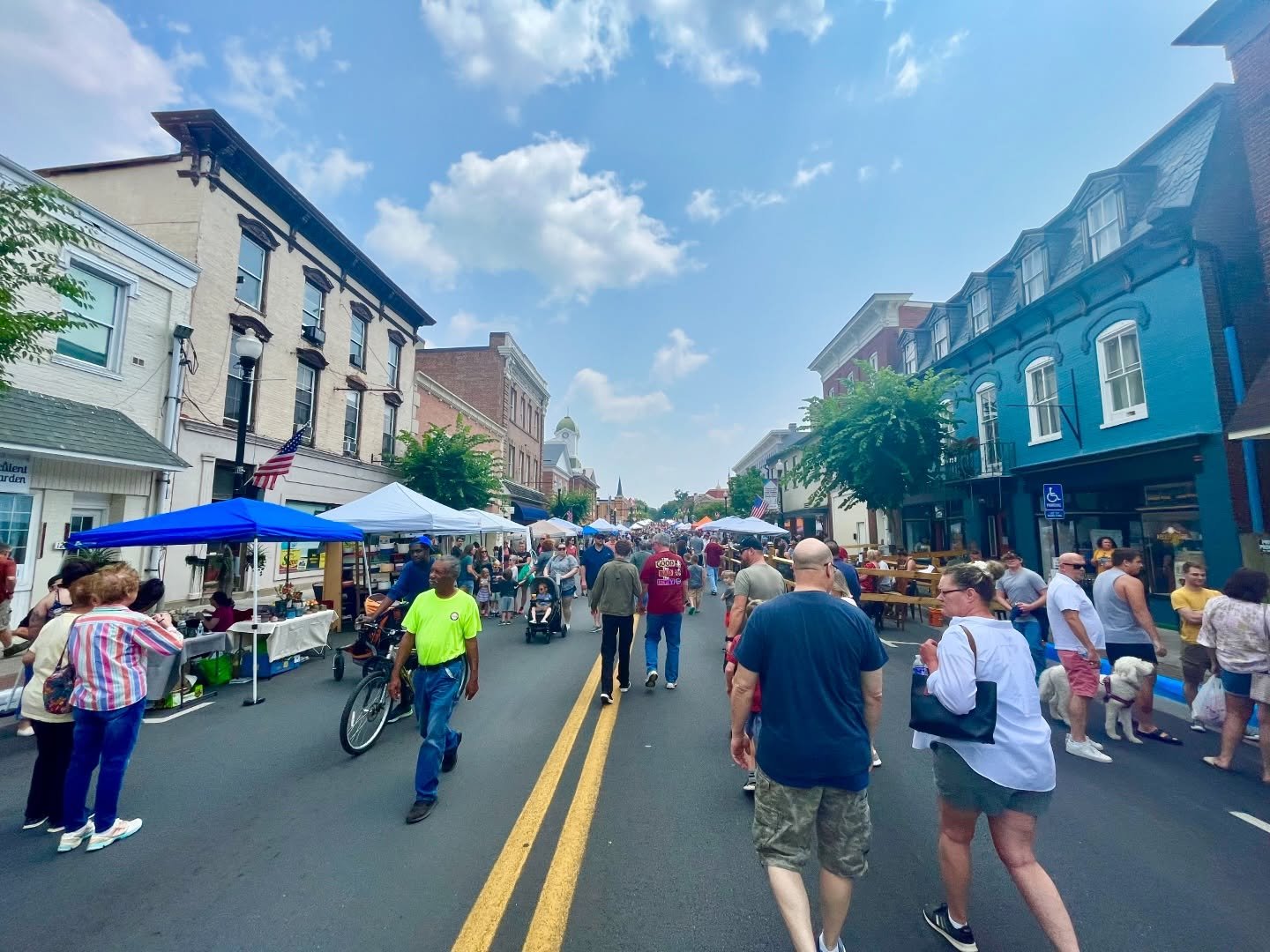 people walking at festival in downtown Charles Town, WV