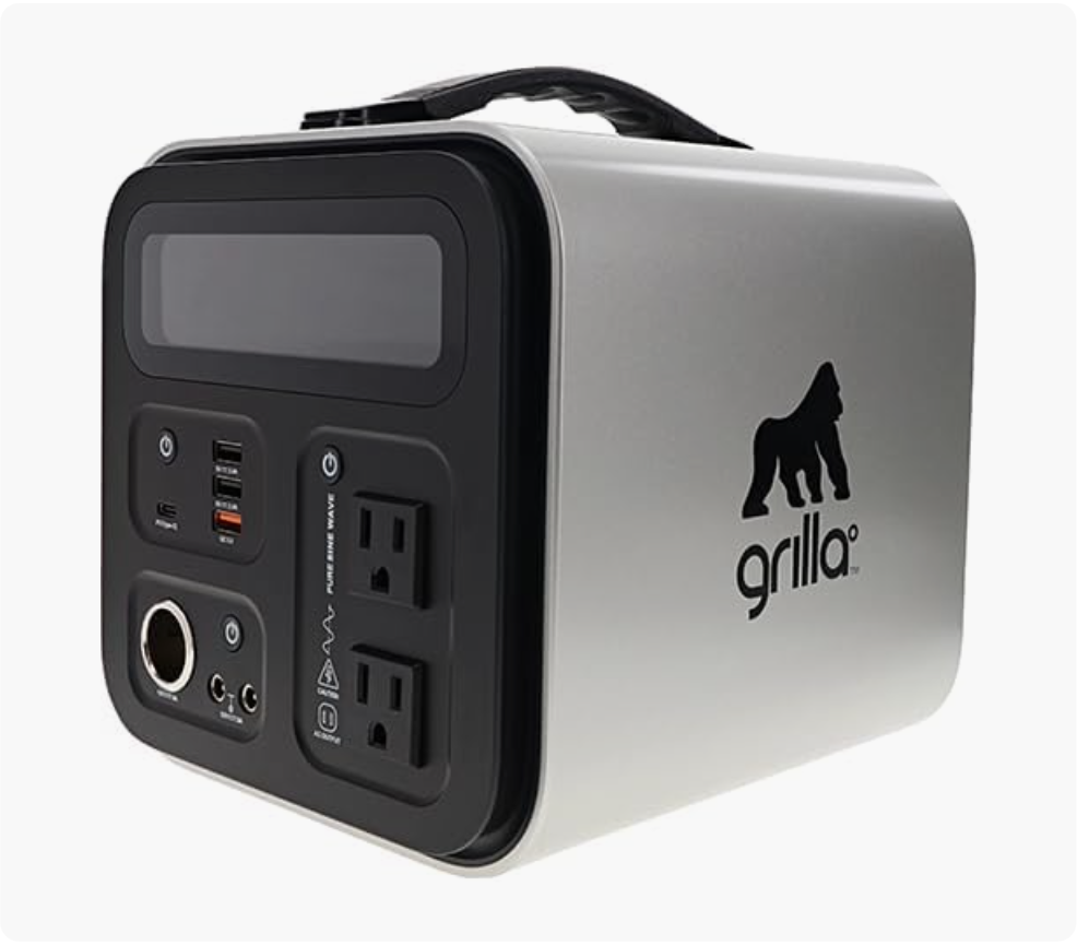 Portable power station with multiple power outlets, USB ports, and control buttons, branded with a gorilla image and the word 'grilla'.