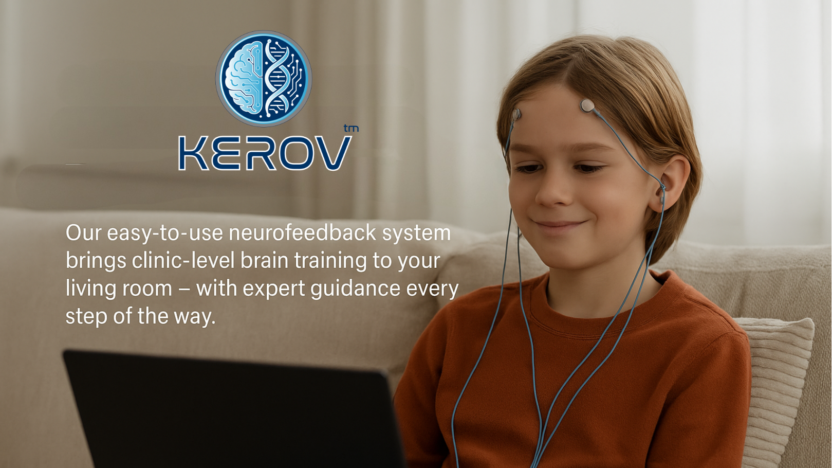 Boy smiling during at-home neurofeedback session with laptop — Kerov Health