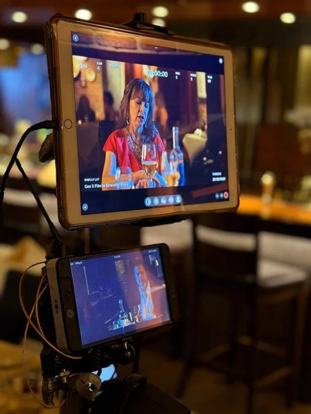 Behind-the-scenes filming of Underneath a Glittery Moon, a romantic comedy set in Scottsdale, Arizona, featuring cast members during production of this feel-good love story.