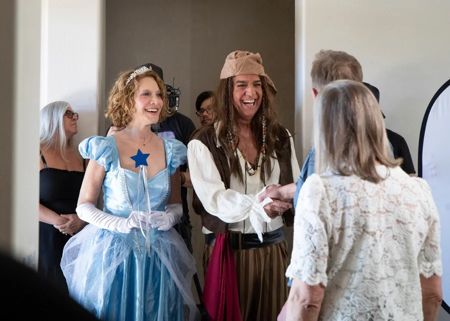 Debrah Rich and Mark Bork attend a costume party
