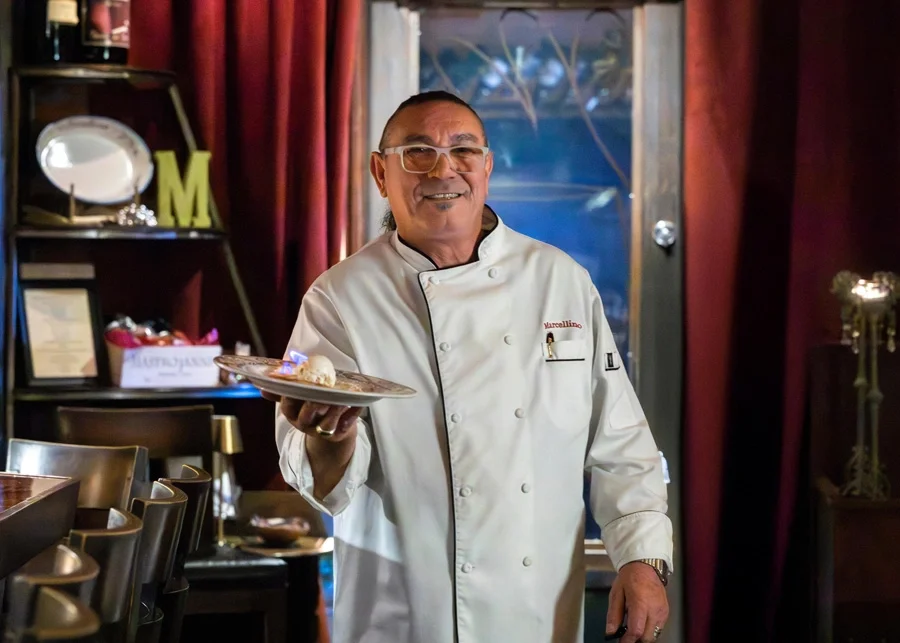 Chef Marcellino delivers a specialty dessert