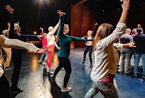 Dance scene from Underneath a Glittery Moon, adding expressive movement and energy to this feel-good romantic comedy film.