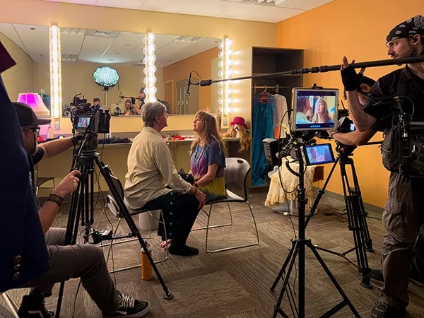 Filming of Underneath a Glittery Moon, a romantic comedy set in Scottsdale, Arizona, featuring cast members during production of this feel-good love story.