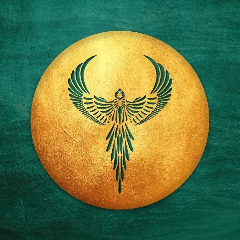 A round gold emblem with a stylized phoenix with outstretched wings on a green background.