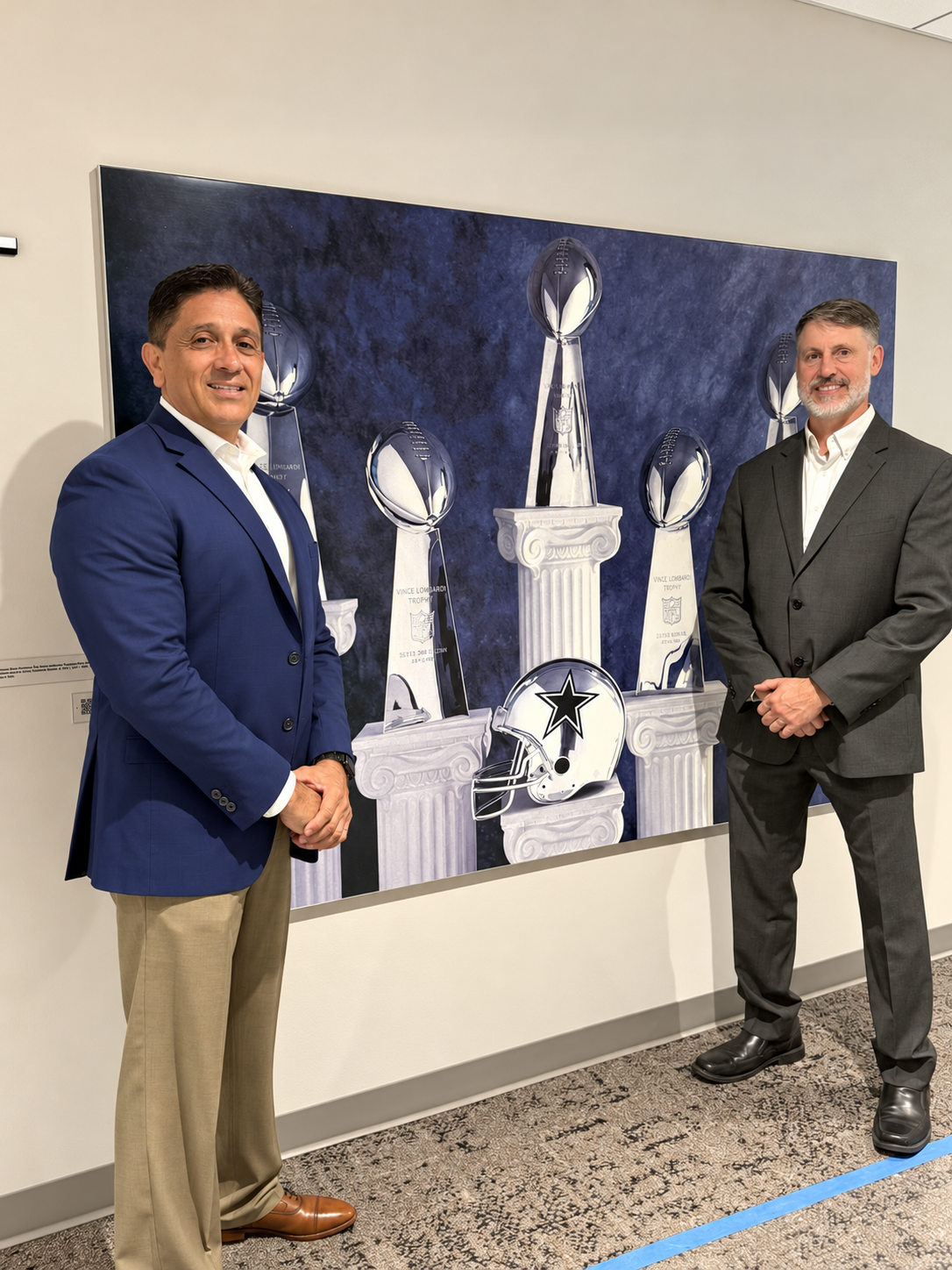 Mark Herrera with a colleague at AT&T Stadium, home of the Dallas Cowboys.