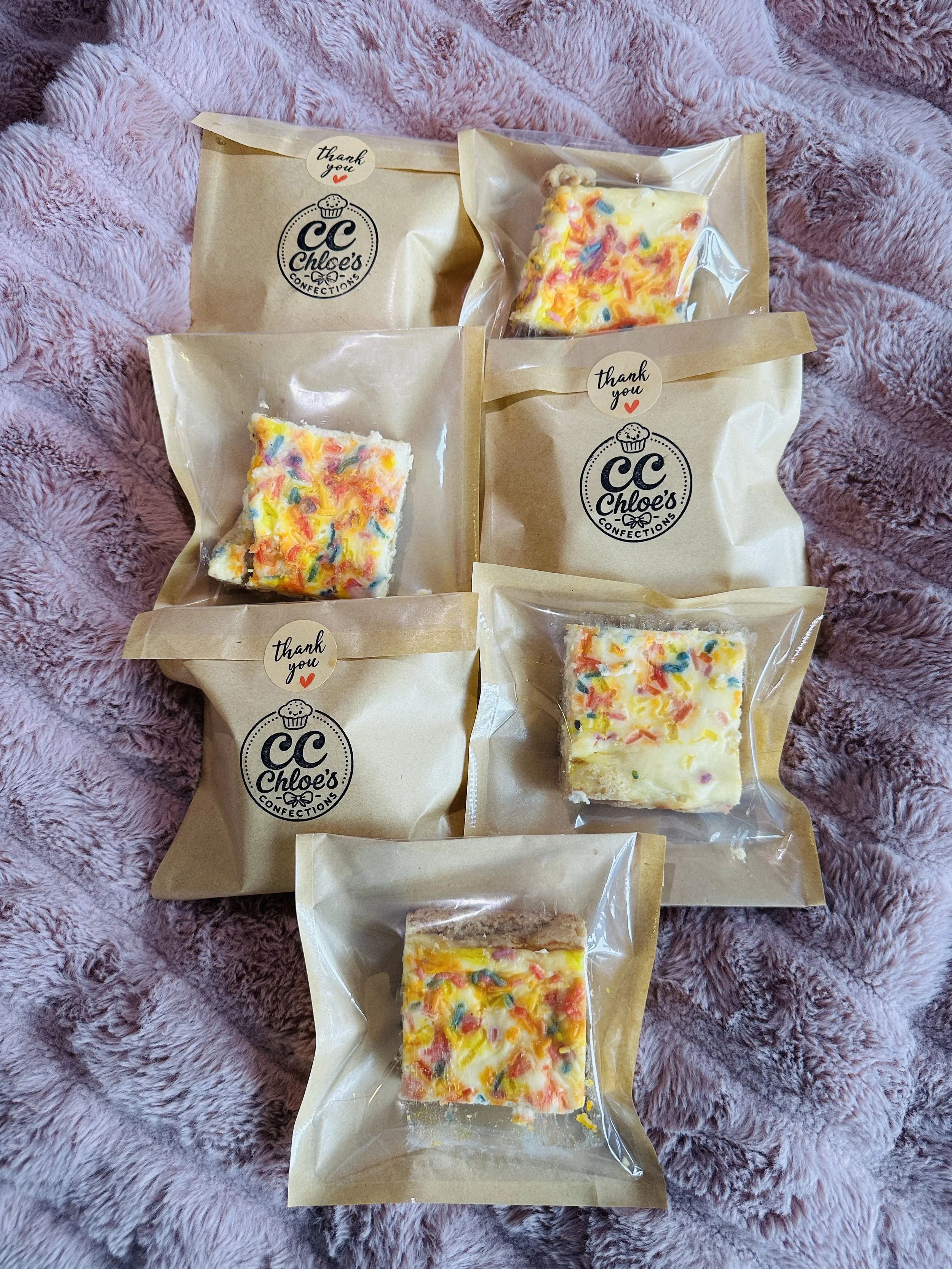 Confetti Sugar Cookie Cheesecake Bars