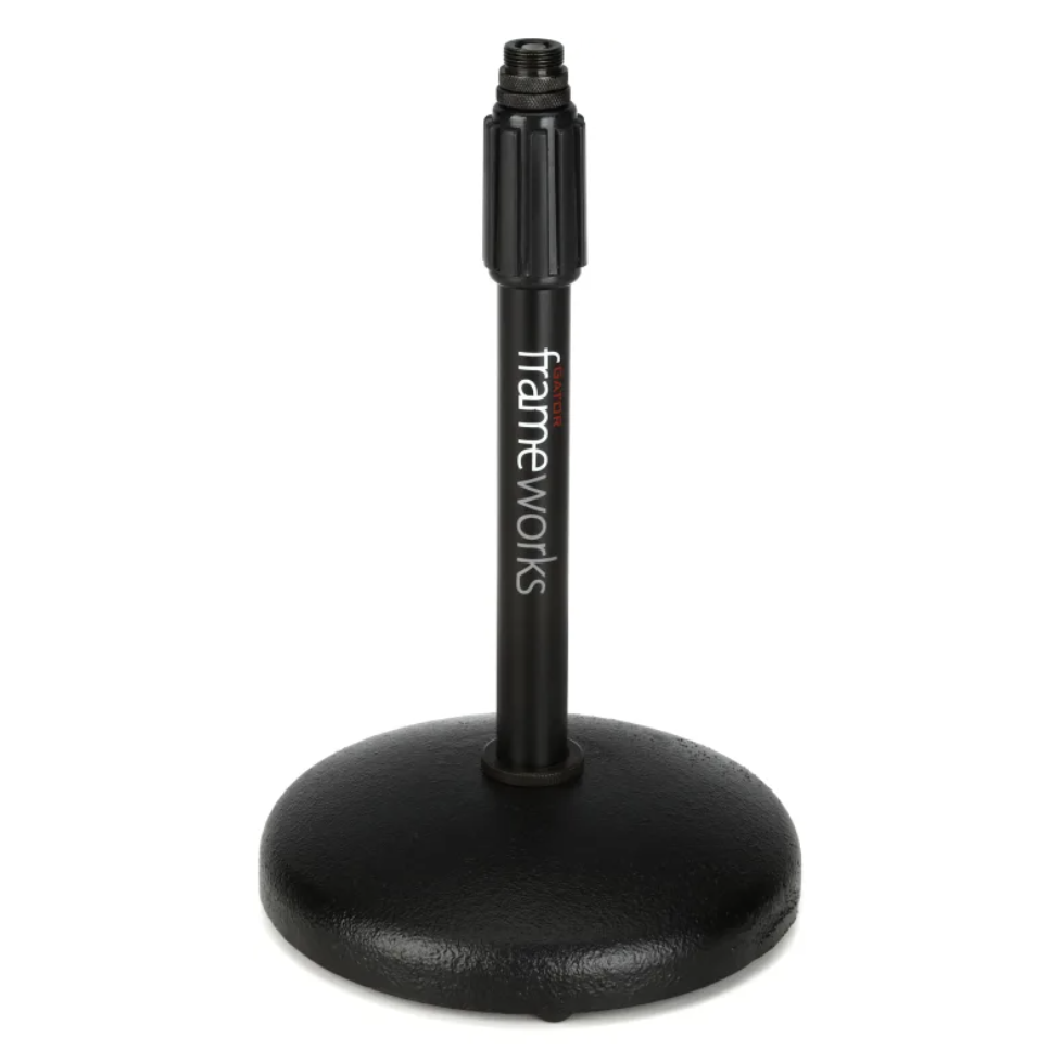 Black pressurized water spray bottle with a round base and attached threaded nozzle, labeled 'TRAME WORKS'.