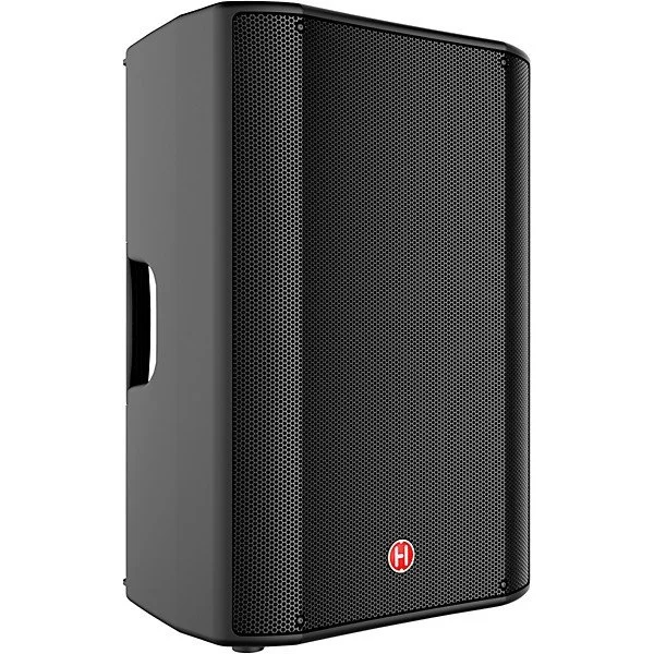 Black portable loudspeaker with a perforated front grille and a small red logo at the bottom center, featuring a handle cutout on the side.