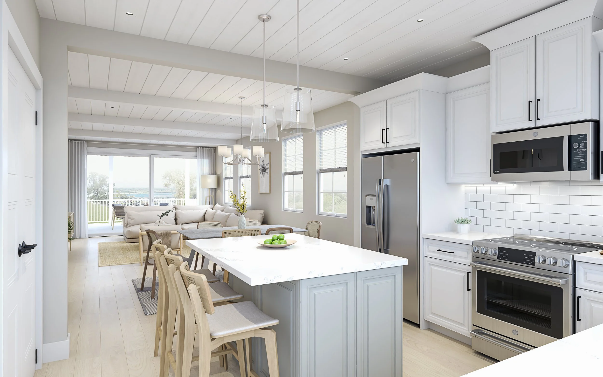 Open-concept kitchen and living room with dining island, white cabinets, stainless steel appliances, and large windows overlooking a balcony with a view.