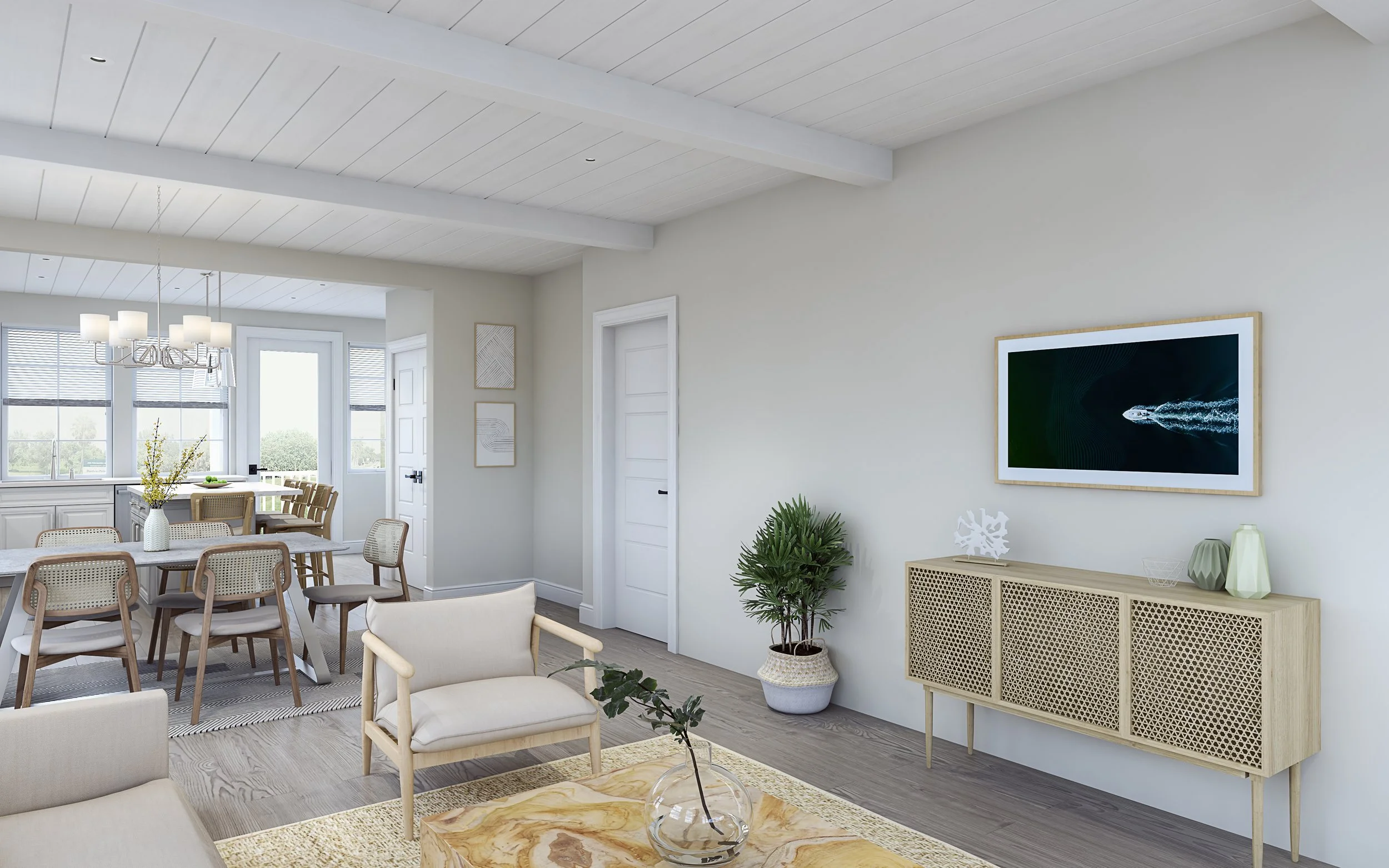 Open-concept living and dining area with white walls, light wood furniture, a wall-mounted TV with an abstract image, and a window letting in natural light.