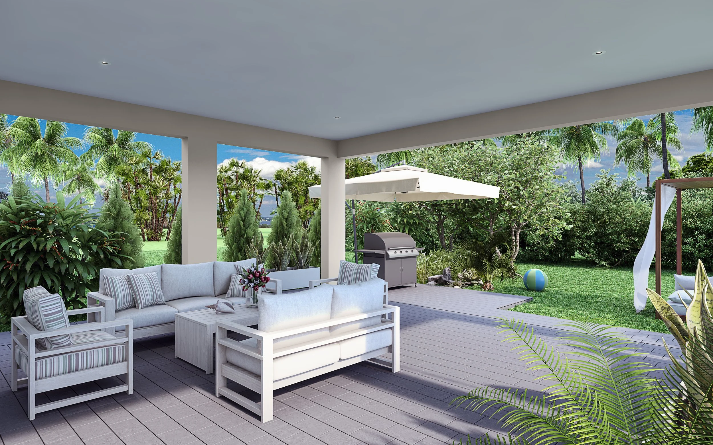 Covered outdoor patio with white wicker furniture and striped cushions, a dining table with a flower centerpiece, a barbecue grill, an umbrella, a lawn with a beach ball, and a garden with lush green trees and plants.