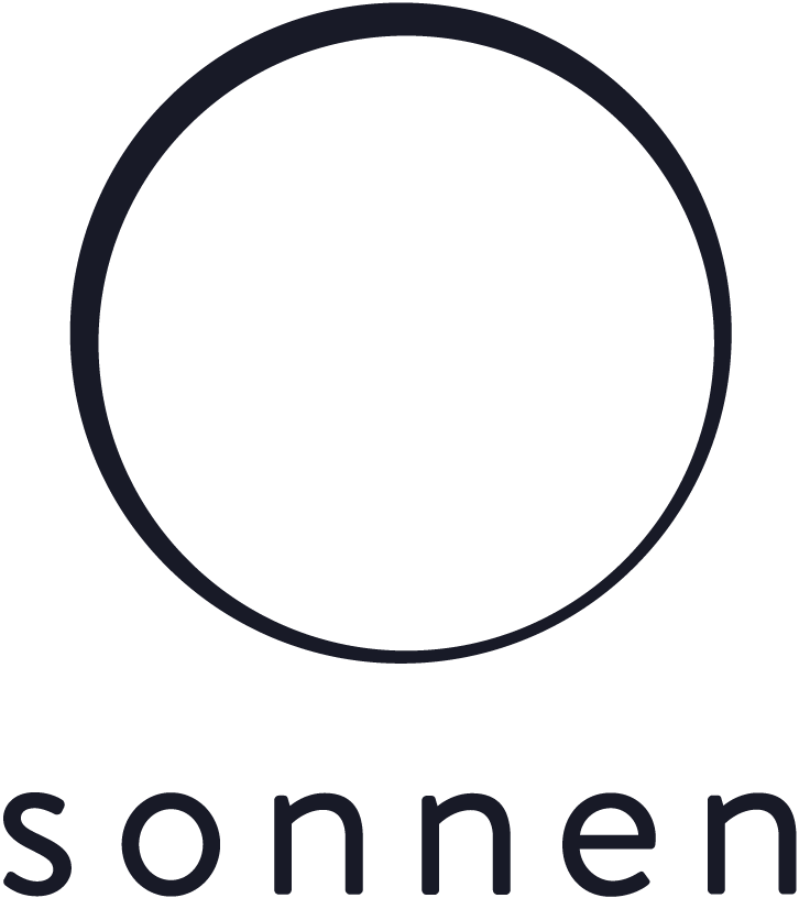 Logo of a company called Sonnnen, featuring a simple black circle with a minus sign inside it, and the word "sonnen" written below.