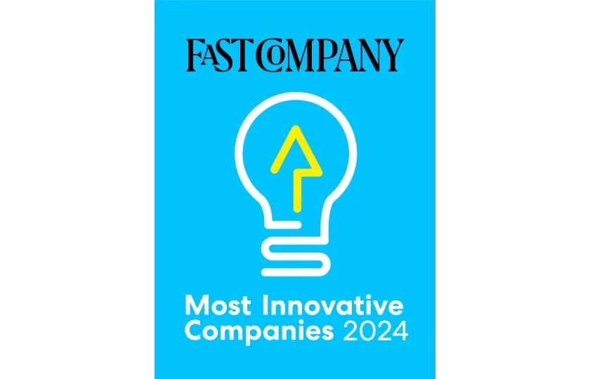 Blue cover page with black and white text and a lightbulb graphic. The text reads "FAST COMPANY" at the top, with "Most Innovative Companies 2024" at the bottom. The lightbulb contains a yellow upward arrow.