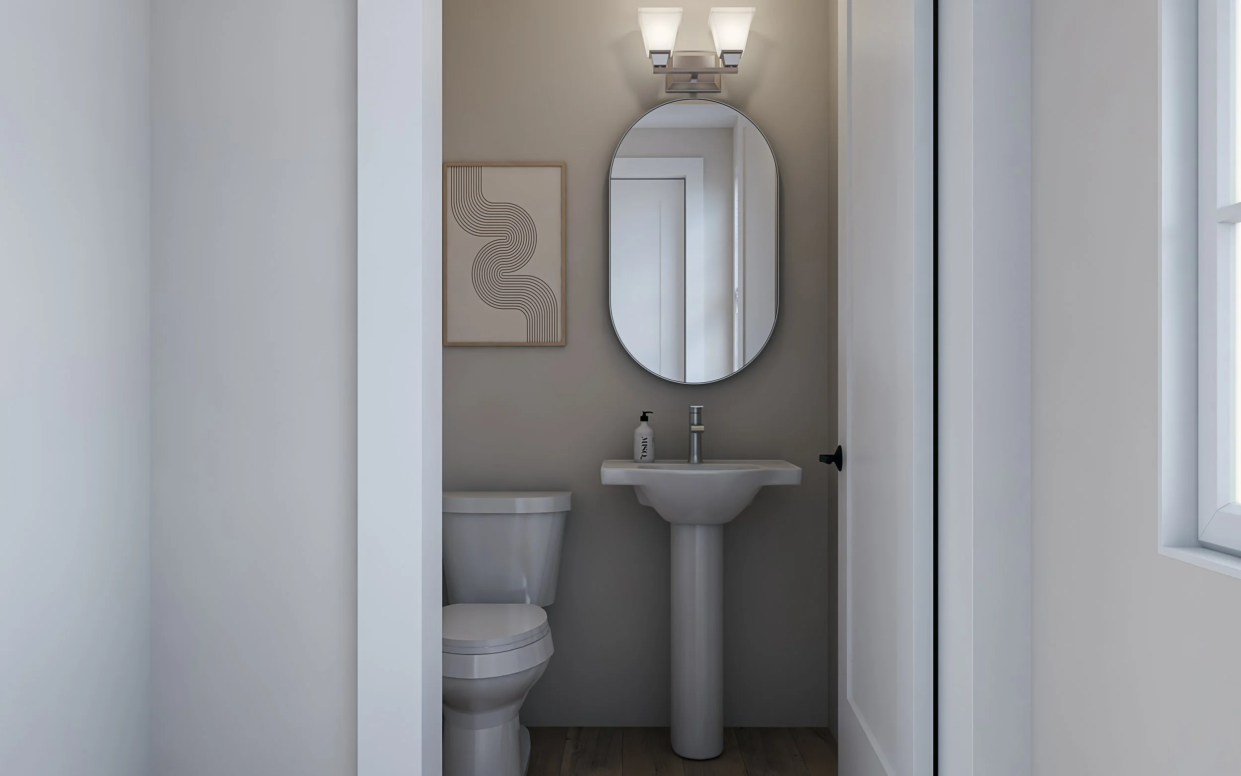 Small bathroom with a white toilet, pedestal sink with a soap dispenser, oval mirror, art wall decor, and window, modern minimalist style.