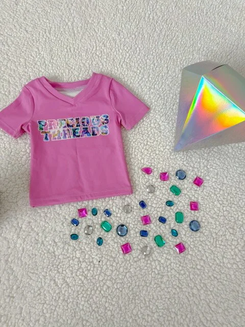 geode baby tee.JPEG