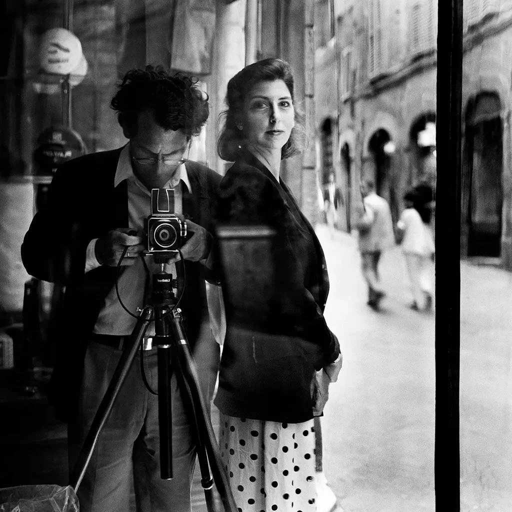 Couple looking into a camera