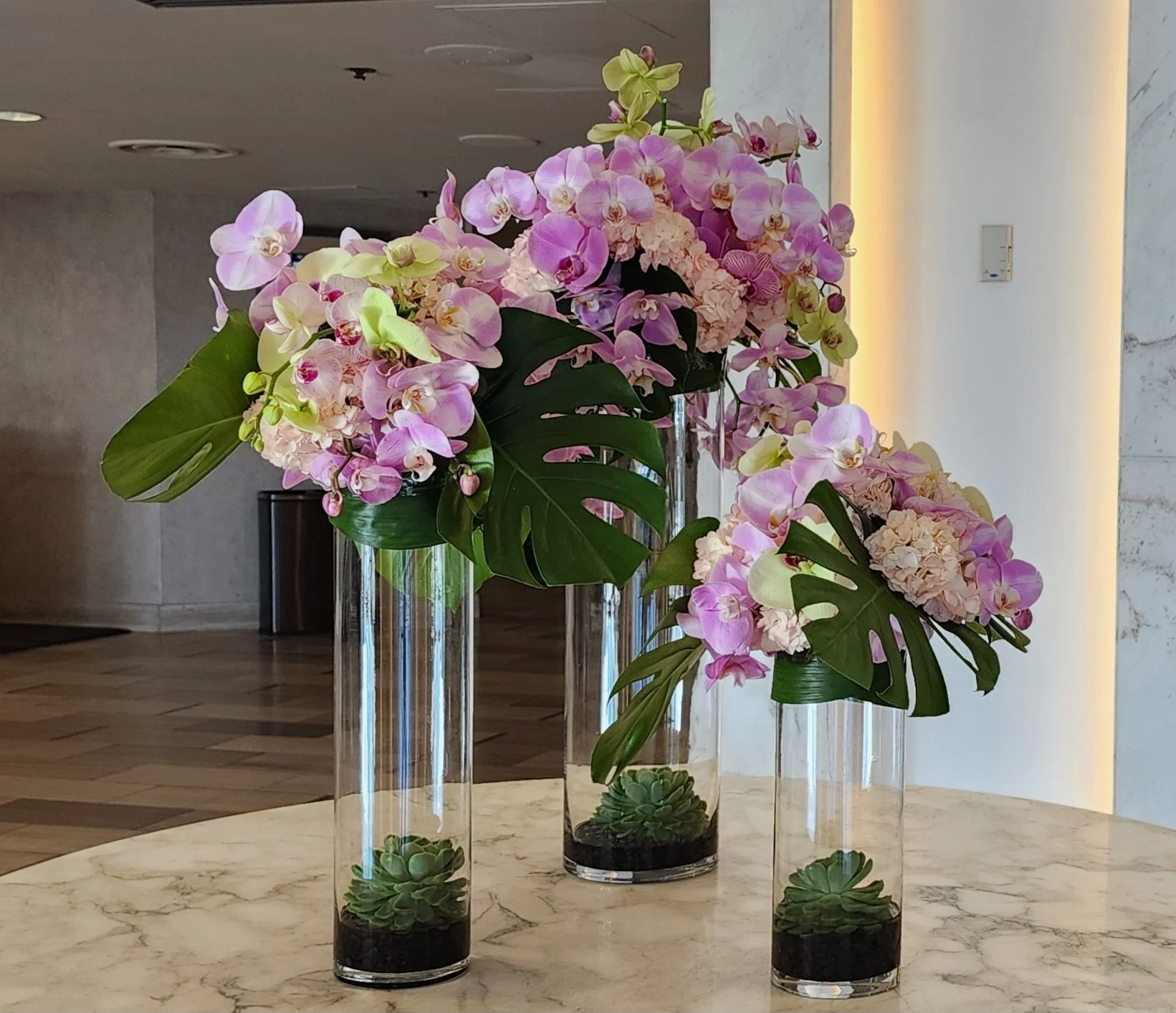 Orchids in Glass Cylinder