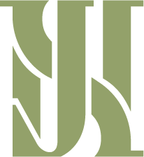 Close-up of a stylized logo with intertwined green and black elements.