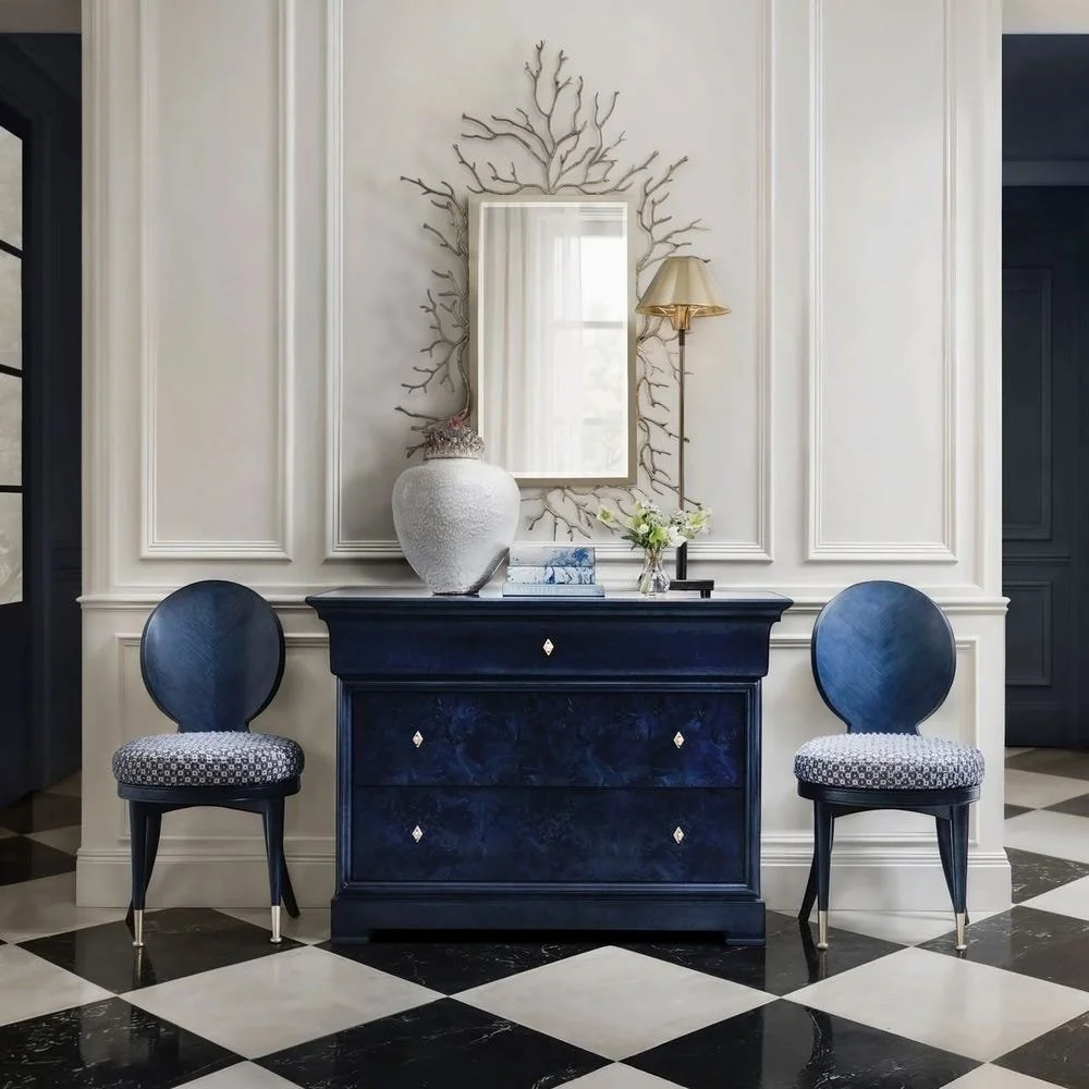 Inspired by 1820s Louis Philippe chests, this piece features exotic Mapa Burl veneer and a unique deep blue finish from a custom seven-step process. It includes solid brass hardware and soft-close oak drawers for a timeless, modern look.