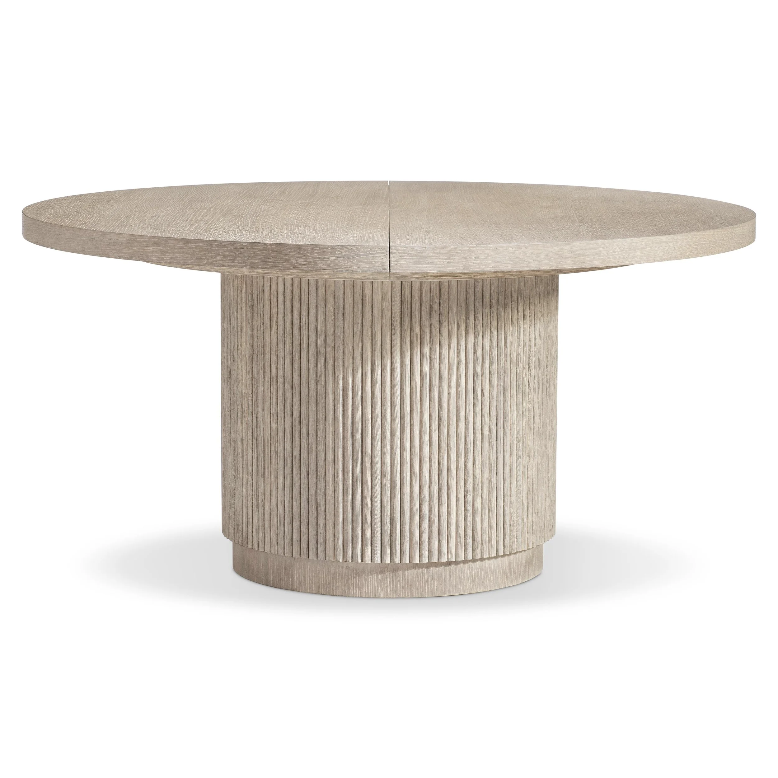 Shape and texture combine for a new take on modern rustic style in this dining table design.