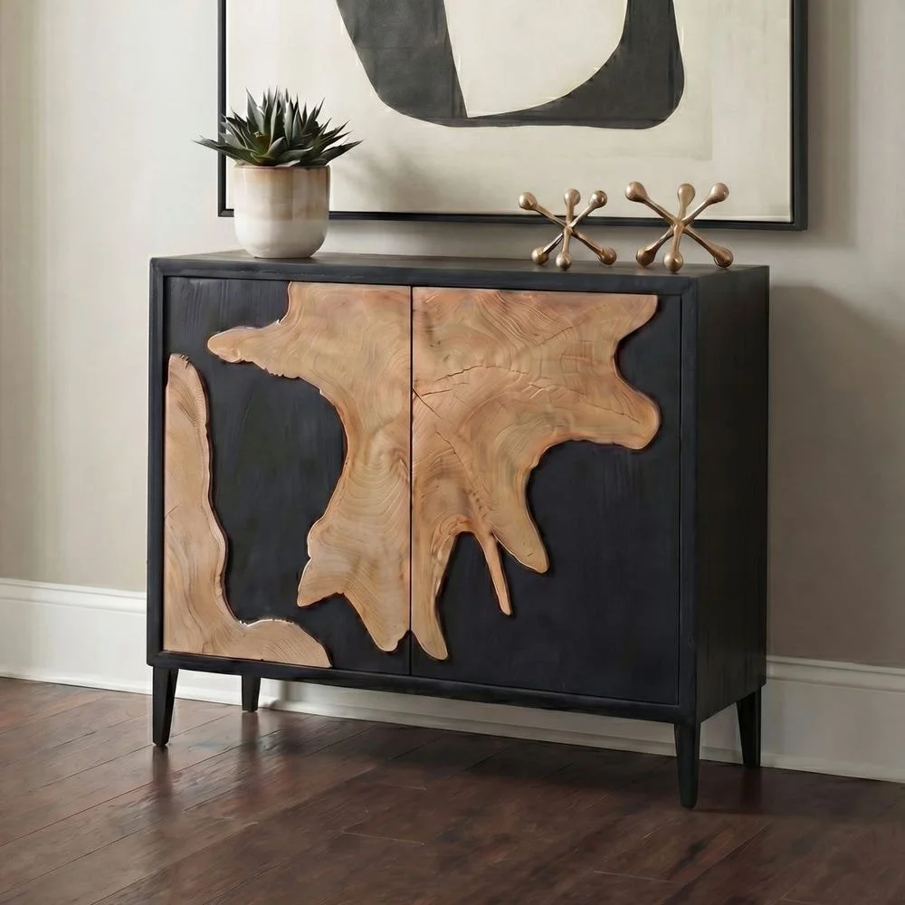 Artisan crafted and naturally bold, the Andrei two Door Cabinet beautifully juxtaposes a refined black wood frame with the raw, organic texture of genuine teak root slice door fronts.