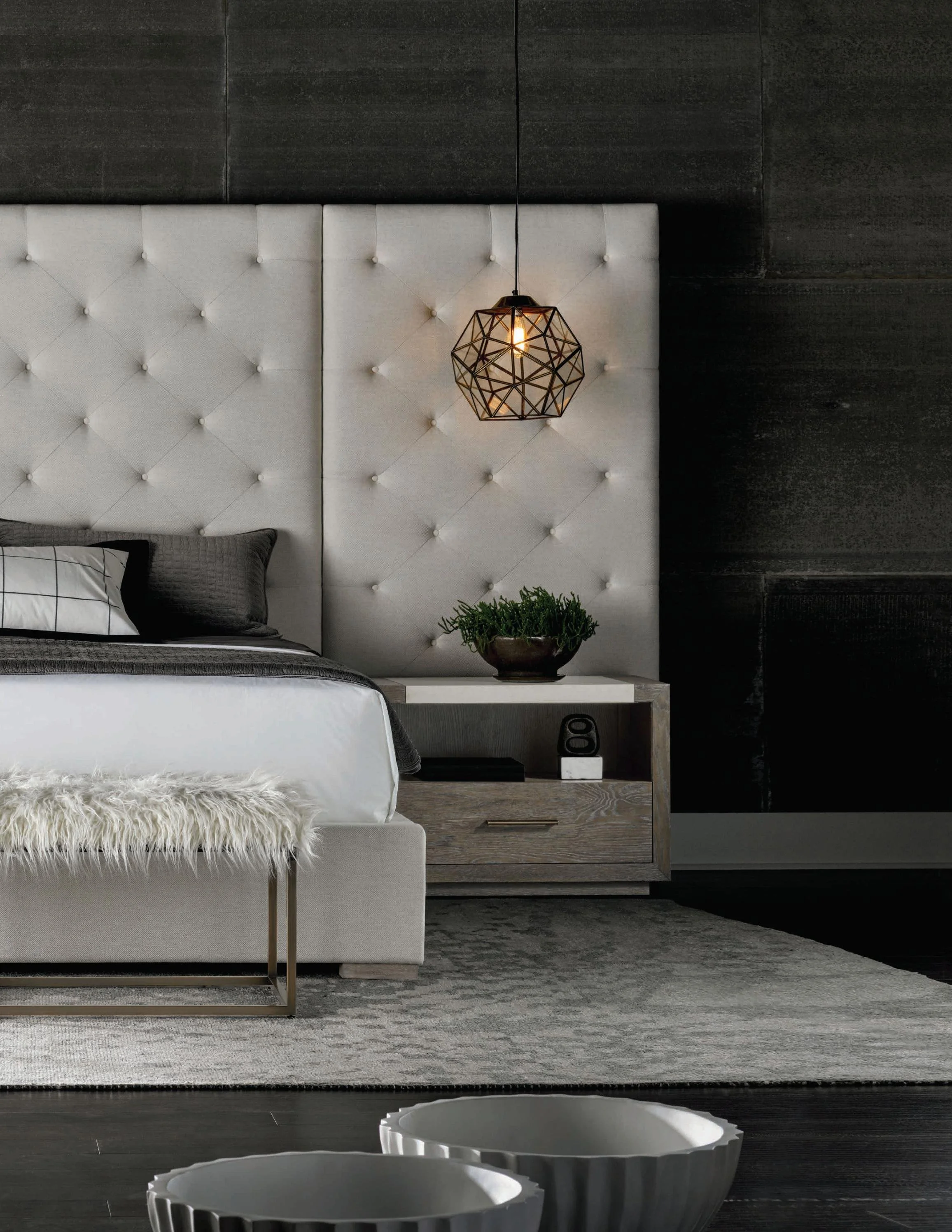 Completely customizable with the addition of extra panels, the glamorous Brando Bed is defined by an oversized, button tufted headboard upholstered in a white performance fabric.