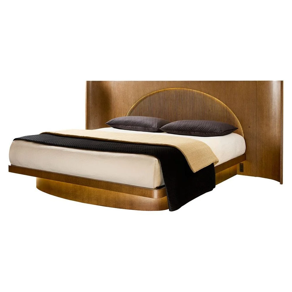 Made of quartered American white oak solids and veneer, its many features include a lighted arch headboard, lighted raised platform, curved recessed foot and two duplex outlets. 