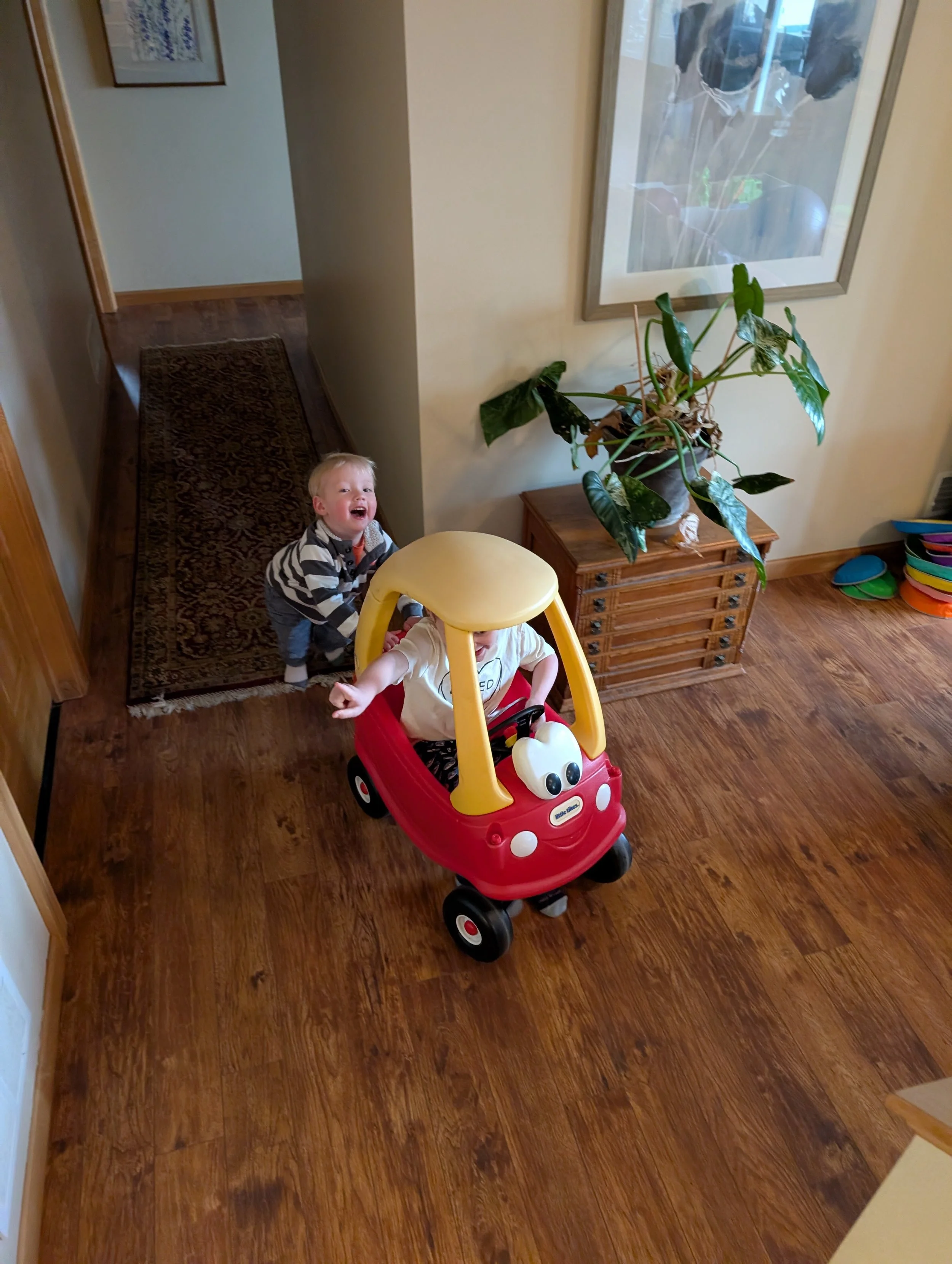 Matthew pushing his cousin.