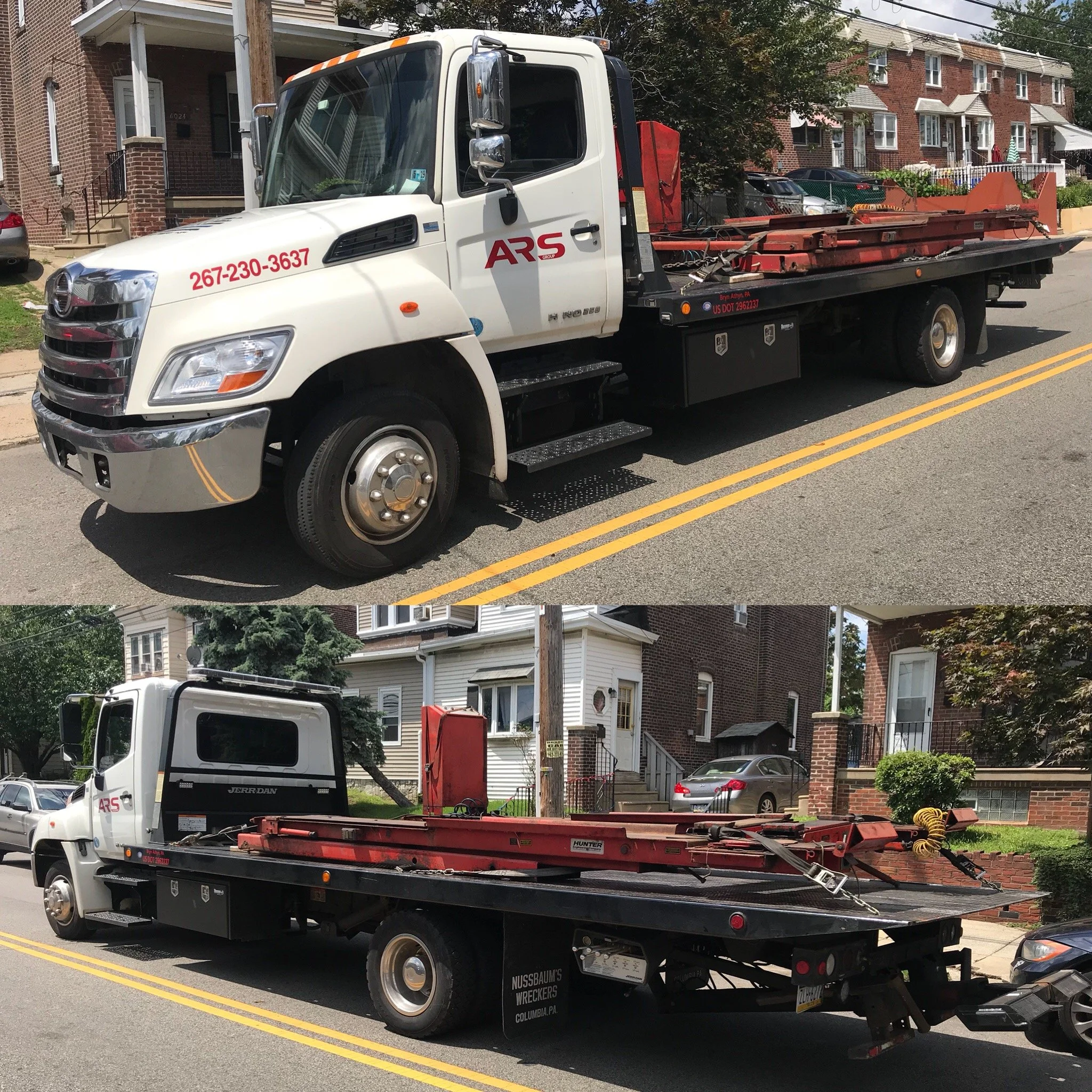 A white flatbed tow truck parked on the street, carrying a red vehicle lift or equipment. The truck has ARS branding, contact number, and city name on the side, with houses and trees in the background.