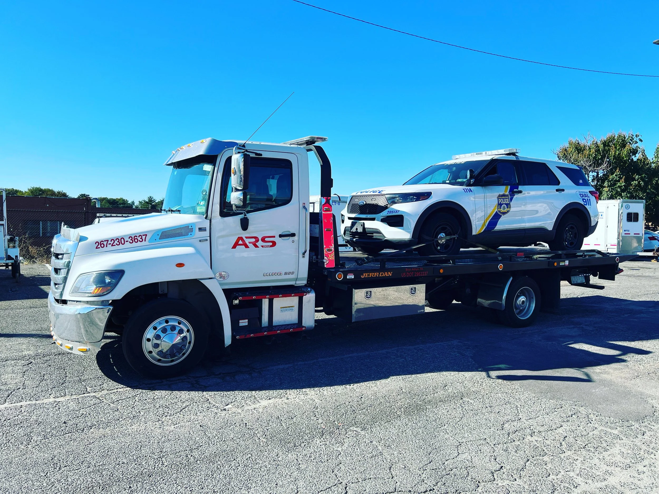 ARS Towing flatbed tow truck providing 24/7 emergency roadside assistance and vehicle recovery in Philadelphia and Southampton, PA.