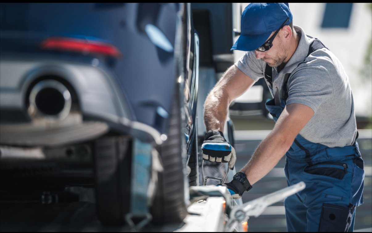 ARS Towing flatbed tow truck providing 24/7 emergency vehicle towing and recovery in Philadelphia, PA