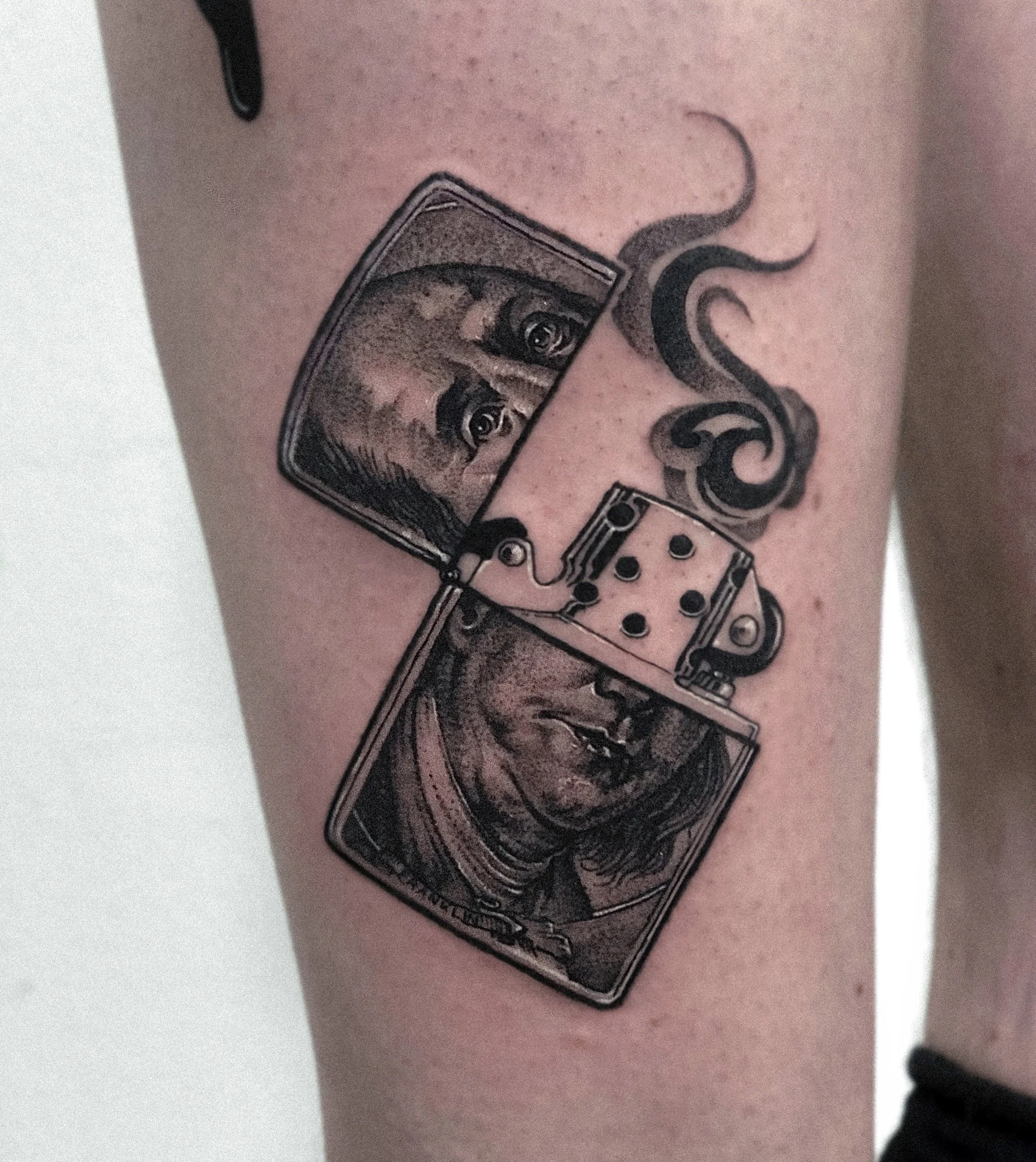 Tattoo of a lighter by Dmytro Shcherbakov