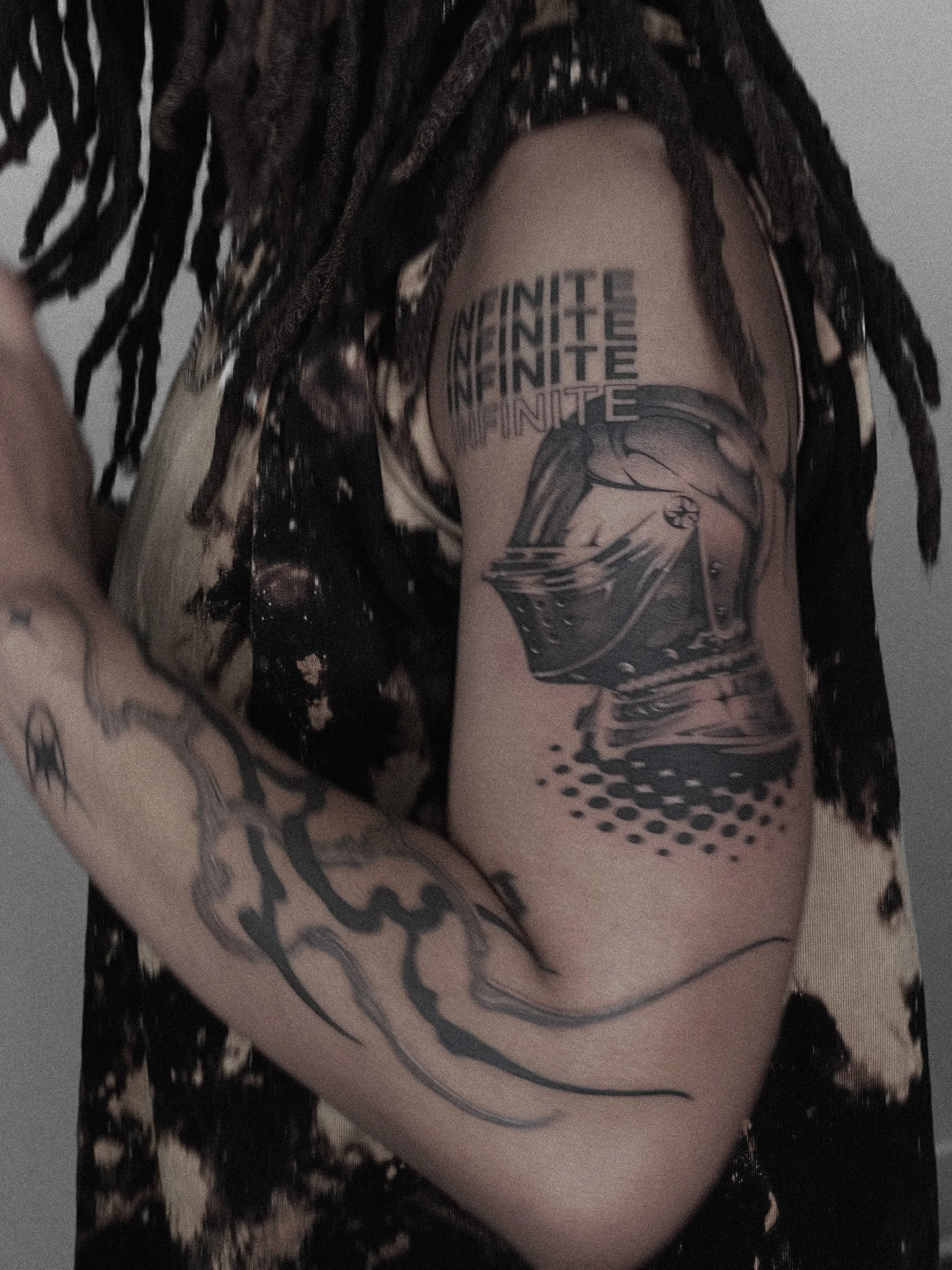 Helmet and tribal tattoo by Dmytro Shcherbakov