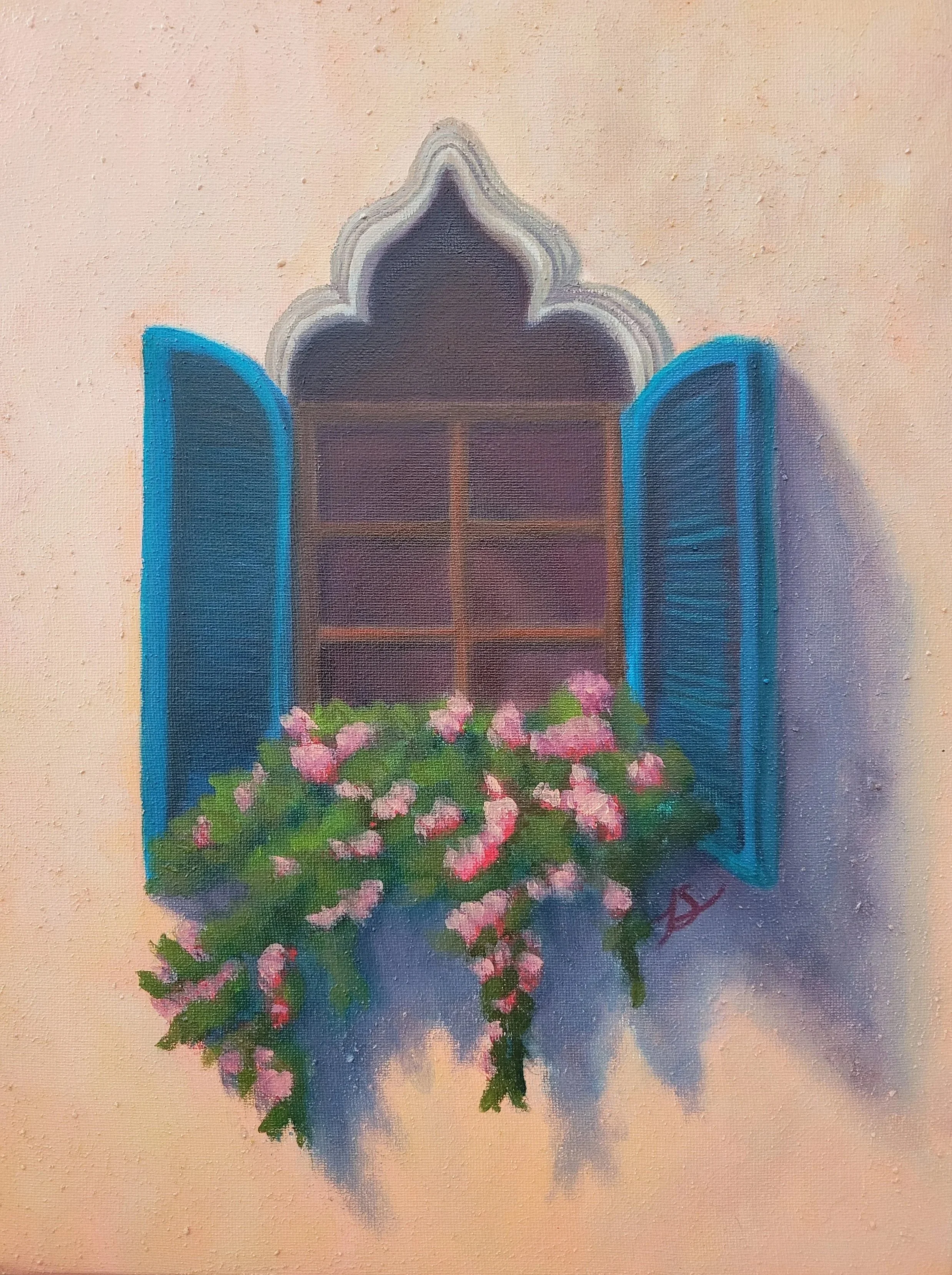 moroccan window with blue shutter and bougainvillea flowers hanging casting afternoon shadows on a stucco wall